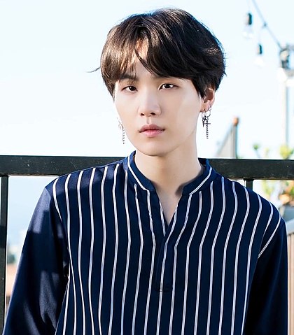 How tall is Suga from BTS? 